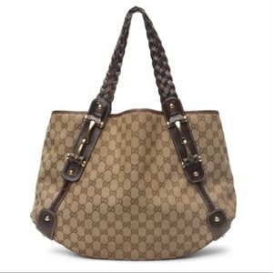 Gucci braided handle GG canvas bag.